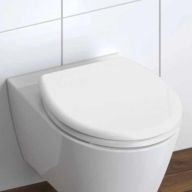 abattant-wc-en-duroplast-white-avec-frein-de-chute-et-declipsable (6).jpg SCHÜTTE